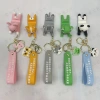 Cartoon character keychains, creative phone stands, car key pendants, cute couple bags and accessories Item Picture